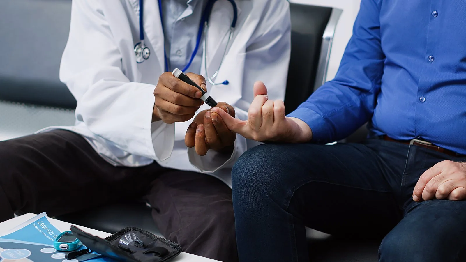 A doctor measuring a patient's blood pressure during a comprehensive health check