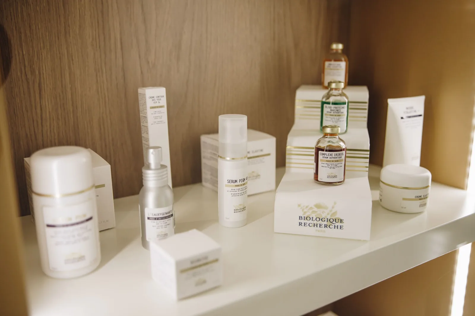 LED lit shelf of luxury Biologique Recherche skincare products at the Miren Medic clinic.